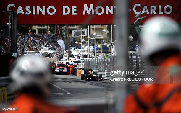 Red Bull's Australian driver Mark Webber drives at the Monaco street circuit on May 16 during the Monaco Formula One Grand Prix. AFP PHOTO / FRED...