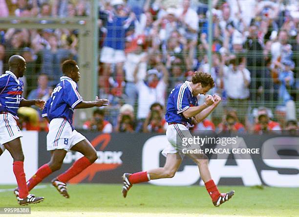 French defender Laurent Blanc jubilates after scoring 28 June at the Felix Bollaert stadium in Lens, northern France, during the 1998 Soccer World...