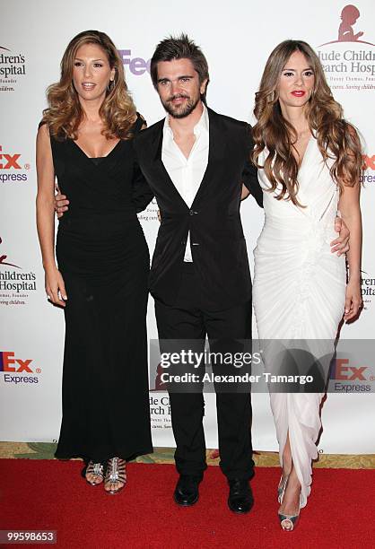 Daisy Fuentes, Juanes and Karen Martinez arrive at 8th annual FedEx and St. Jude Angels and Stars Gala at InterContinental Hotel on May 15, 2010 in...