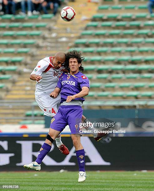 Sergio Almiron of Bari and Stevan Jovetic of Fiorentina in action during the Serie A match between AS Bari and ACF Fiorentina at Stadio San Nicola on...