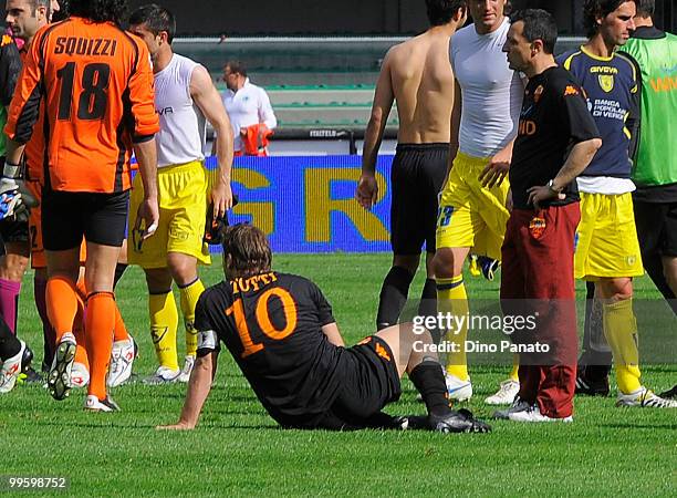 Francesco Totti of Roma shows his dejection sits on the pitch at the end Serie A match between AC Chievo Verona and AS Roma at Stadio Marc'Antonio...