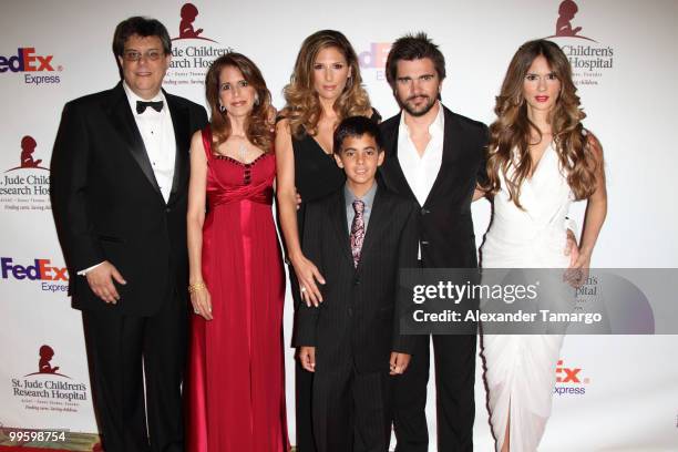 Daisy Fuentes, Juanes and Karen Martinez pose with St. Jude executives at 8th annual FedEx and St. Jude Angels and Stars Gala at InterContinental...