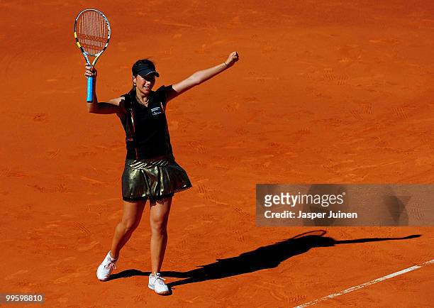 Aravane Rezai of France celebrates matchpoint over Venus Williams of the USA in their final match during the Mutua Madrilena Madrid Open tennis...