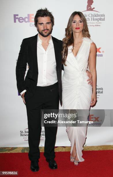 Juanes and wife Karen Martinez arrive at 8th annual FedEx and St. Jude Angels and Stars Gala at InterContinental Hotel on May 15, 2010 in Miami,...