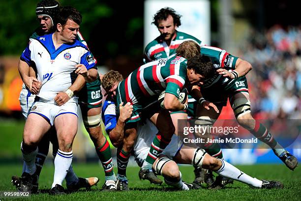 Ben Youngs of Leicester Tigers is tackled by Butch James of Bath during the Guinness Premiership Semi Final match between Leicester Tigers and Bath...