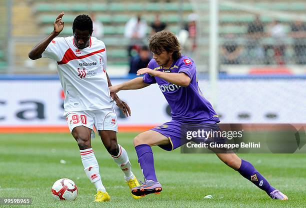 Edgar Alvarez of Bari and Adem Ljajic of Fiorentina in action during the Serie A match between AS Bari and ACF Fiorentina at Stadio San Nicola on May...