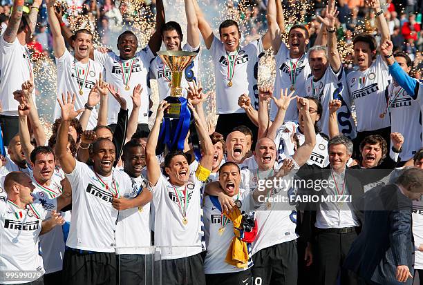 Inter Milan's team celebrate with the trophy during the ceremony of the Italian Serie A title on May 16, 2010 in Siena. Inter Milan secured a fifth...