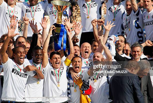 Inter Milan's team celebrate with the trophy during the ceremony of the Italian Serie A title on May 16, 2010 in Siena. Inter Milan secured a fifth...