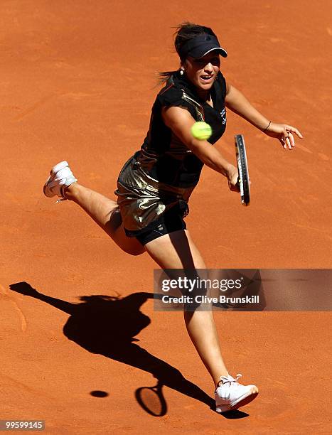 Aravane Rezai of France plays a backhand against Venus Williams of the USA in the womens final match during the Mutua Madrilena Madrid Open tennis...