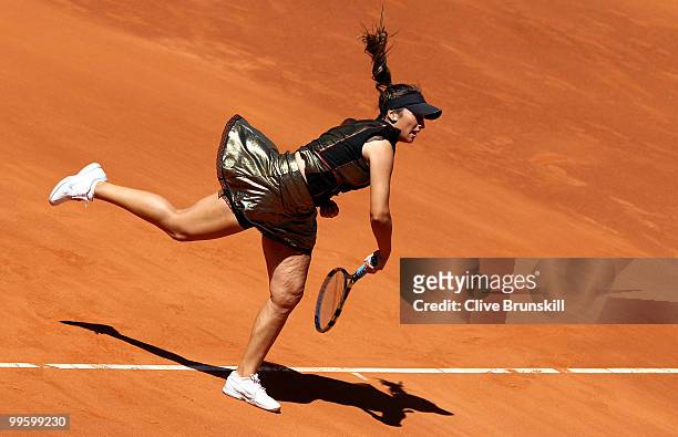 Aravane Rezai of France serves against Venus Williams of the USA in the womens final match during the Mutua Madrilena Madrid Open tennis tournament...