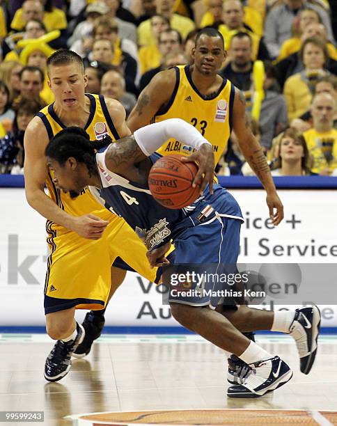 Steffen Hamann of Berlin fights for the ball with Aubrey Reese of Frankfurt during the Beko Basketball Bundesliga Play-Off match between Alba Berlin...