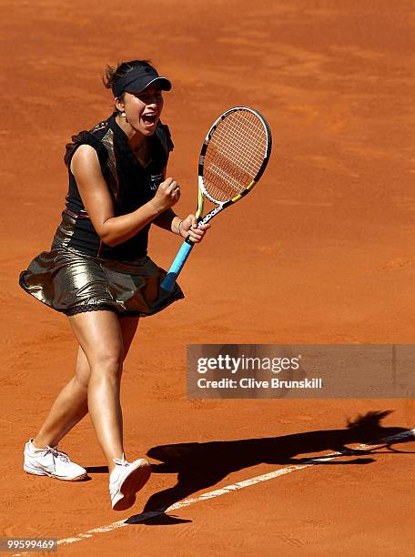 Aravane Rezai of France celebrates match point against Venus Williams of the USA in the womens final match during the Mutua Madrilena Madrid Open...