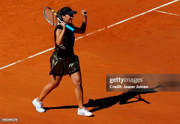 Aravane Rezai of France celebrates matchpoint over Venus Williams of the USA in their final match during the Mutua Madrilena Madrid Open tennis...