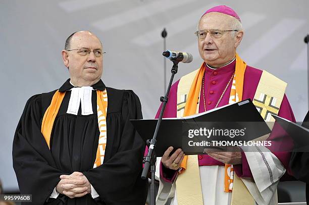 Head of the Council of the Evangelical Church in Germany, Nikolaus Schneider and Robert Zollitsch, head of the Catholic Church in Germany address the...