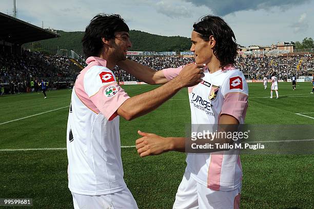 Edinson Cavani of Palermo celebrates with his team mate Javier Pastore after scoring a penalty during the Serie A match between Atalanta BC and US...