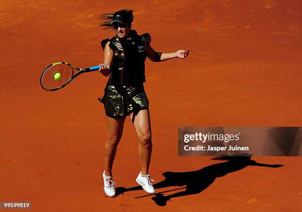Aravane Rezai of France plays a backhand to Venus Williams of the USA in their final match during the Mutua Madrilena Madrid Open tennis tournament...