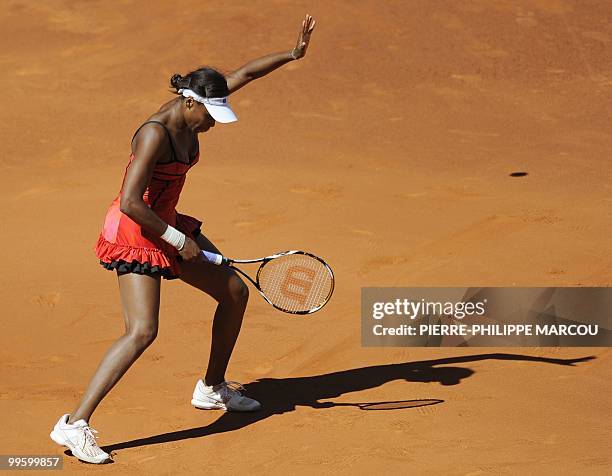 Venus Williams gestures as she plays against French Aravane Rezai during their final match of the Madrid Masters on May 16, 2010 at the Caja Magic...