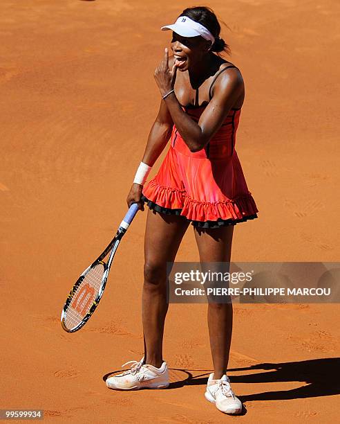 Venus Williams gestures as she plays against French Aravane Rezai during their final match of the Madrid Masters on May 16, 2010 at the Caja Magic...