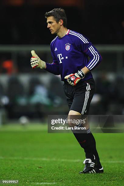 Goalkeeper Hans-Joerg Butt of Bayern gestures during the DFB Cup final match between SV Werder Bremen and FC Bayern Muenchen at Olympic Stadium on...