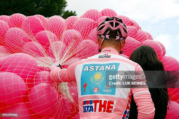 Kazakhstan's Alexandre Vinokourov of team Astana holds ballons prior to the start of the 8th stage of the 93rd Giro d'Italia, in Monte Terminillo on...