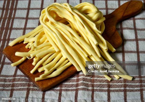 traditional twine cheese - enoki mushroom stock pictures, royalty-free photos & images