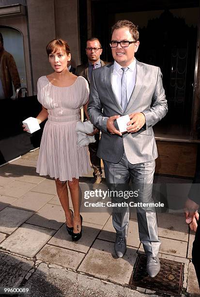 Alan Carr and Natalie Imbruglia leave the wedding of David Walliams and Lara Stone at Claridge's Hotel on May 16, 2010 in London, England.