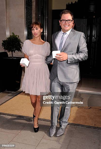 Alan Carr and Natalie Imbruglia leave the wedding of David Walliams and Lara Stone at Claridge's Hotel on May 16, 2010 in London, England.
