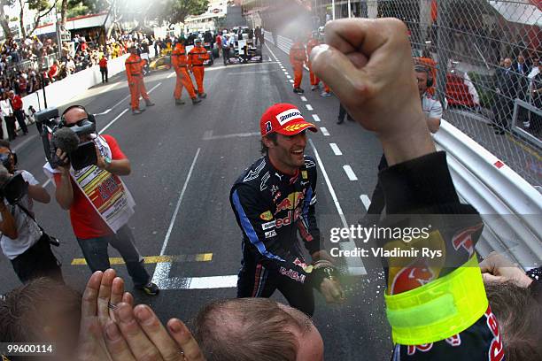 Mark Webber of Australia and Red Bull Racing celebrates with team mates after winning the Monaco Formula One Grand Prix at the Monte Carlo Circuit on...