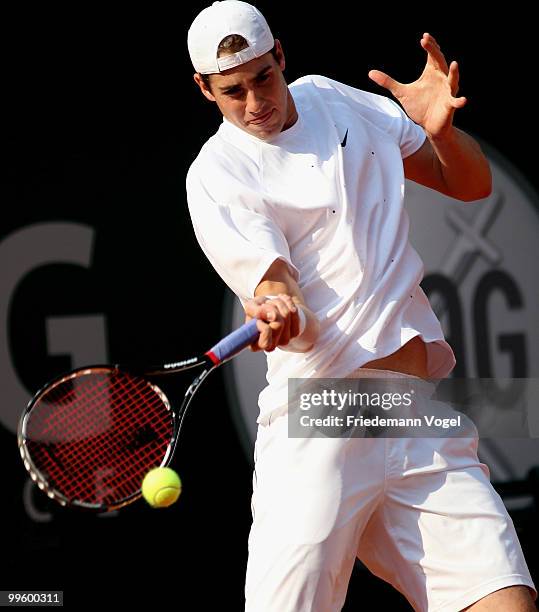 John Isner of the USA in action during his match against Lleyton Hewitt of Australia during day one of the ARAG World Team Cup at the Rochusclub on...