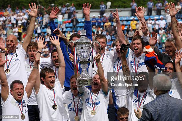 Players of FC Zenit St. Petersburg celebrate with the trophy at the end of the Russian Cup final match between FC Zenit St. Petersburg and FC Sibir...