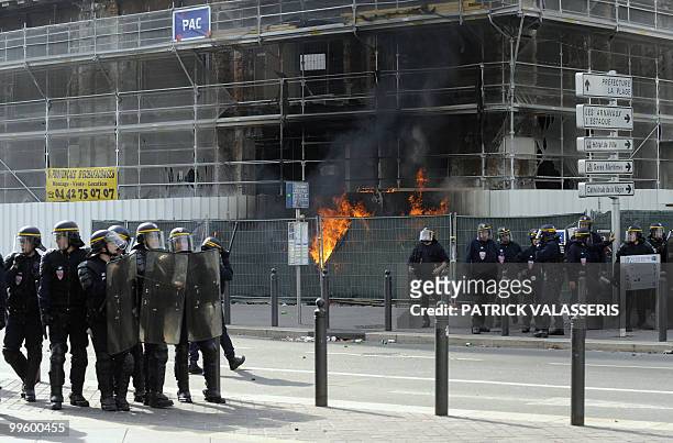 French anti-riot policemen take position on May 16, 2010 in Marseille, southern France during a street clash that broke out after Olympique de...