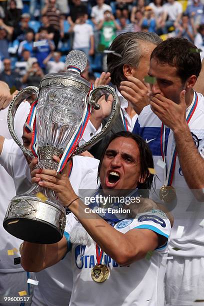 Fernando Meira of FC Zenit St. Petersburg celebrates with the trophy at the end of the Russian Cup final match between FC Zenit St. Petersburg and FC...