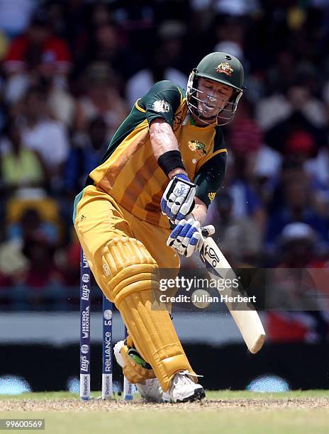 Mike Hussey of Australia scores runs during the final of the ICC World Twenty20 between Australia and England played at the Kensington Oval on May...