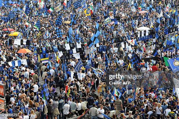 Inter Milan supporters celebrate at Piazza Duomo in Milan after Inter Milan won the Italia Serie A football title on May 16, 2010. Inter Milan...