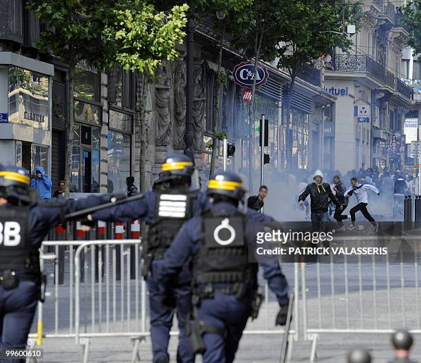 French anti-riot police forces face young people on May 16, 2010 in Marseille southern France during a street clash that broke out after Olympique de...