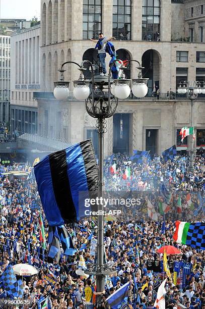 Inter Milan supporters celebrate at Piazza Duomo in Milan after Inter Milan won the Italia Serie A football title on May 16, 2010. Inter Milan...