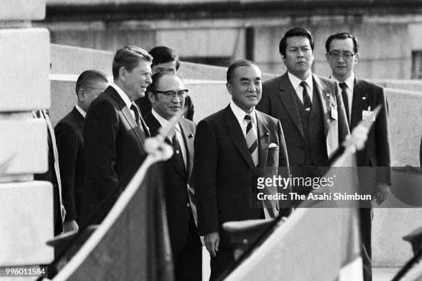 President Ronald Reagan attends the welcome ceremony with Japanese Prime Minister Yasuhiro Nakasone ahead of the Summit meeting at the Akasaka State...