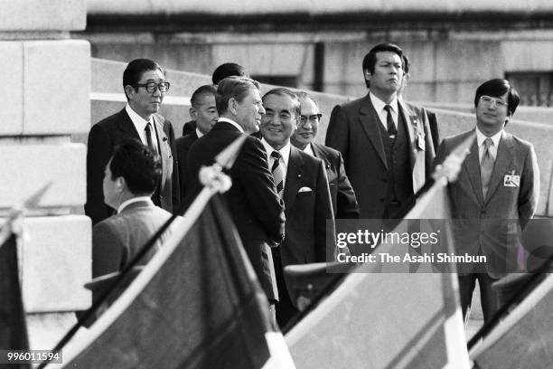 President Ronald Reagan attends the welcome ceremony with Japanese Prime Minister Yasuhiro Nakasone ahead of the Summit meeting at the Akasaka State...