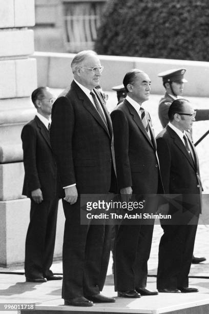 West German Chancellor Helmut Kohl attends the welcome ceremony with Japanese Prime Minister Yasuhiro Nakasone ahead of the Summit meeting at the...