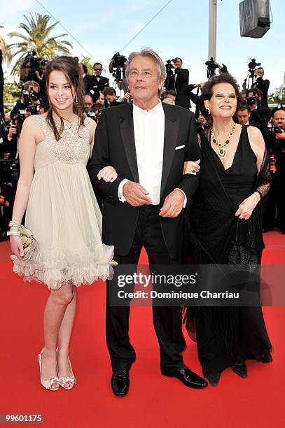 Anouchka Delon, actor Alain Delon and actress Claudia Cardinale attend the 'Il Gattopardo' premiere held at the Palais des Festivals during the 63rd...