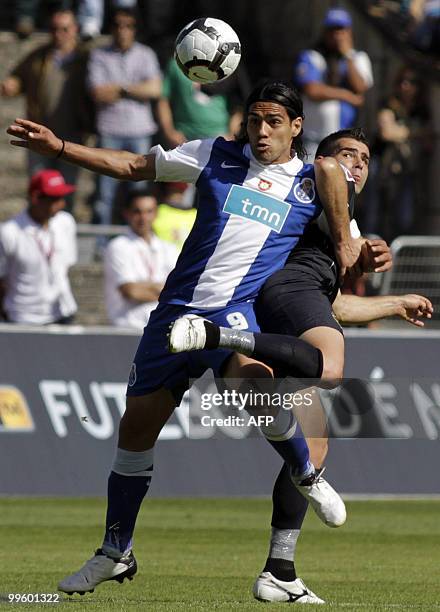 Porto's Colombian forward Radamel Falcao vies with Chaves Lameirao during their Portugual Cup final football match at Jamor Stadium on the outskirts...