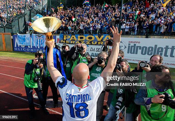 Inter Milan's players celebrate after the trophy ceremony after their team defeated Siena 1-0 to win the Italian Serie A title on May 16, 2010 in...