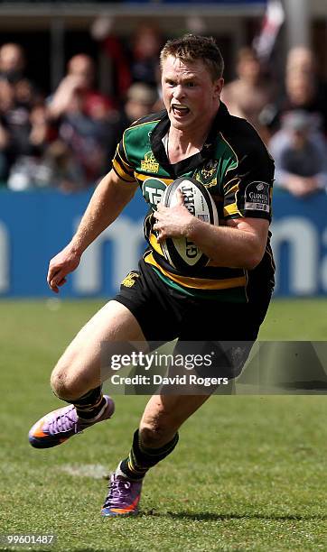 Chris Ashton of Northampton runs with the ball during the Guinness Premiership semi final match between Northampton Saints and Saracens at Franklin's...