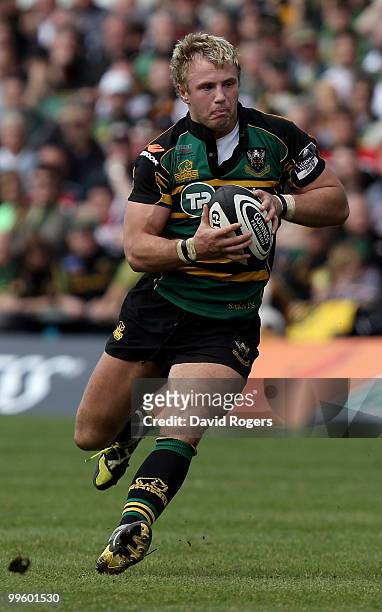 Roger Wilson of Northampton runs with the ball during the Guinness Premiership semi final match between Northampton Saints and Saracens at Franklin's...