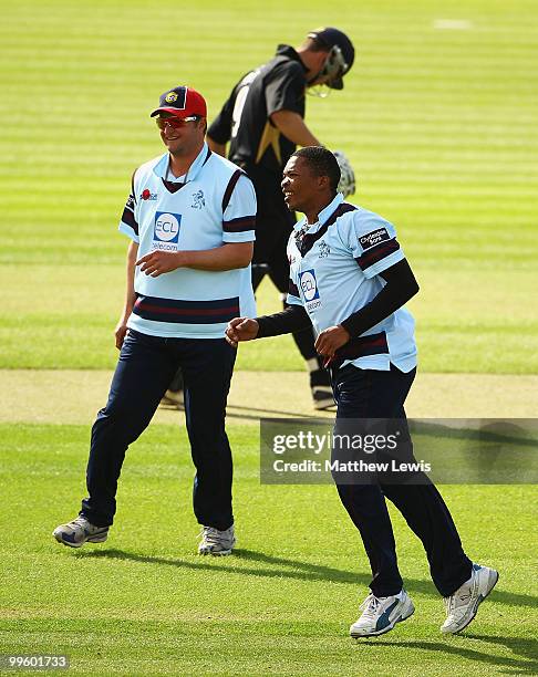 Makhaya Ntini of Kent celebrates the wicket of Jonathan Trott of Warwickshire with his captain Robert Key during the Clydesdale Bank 40 match betwen...