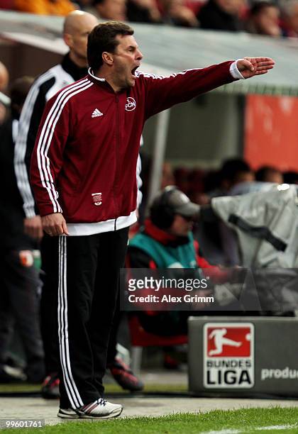 Head coach Dieter Hecking of Nuernberg reacts during the Bundesliga play off leg two match between FC Augsburg and 1. FC Nuernberg at the Impuls...
