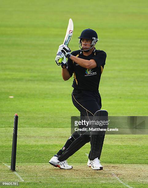 Neil Carter of Warwickshire edges the ball towards the boundary during the Clydesdale Bank 40 match betwen Warwickshire and Kent at Edgbaston on May...