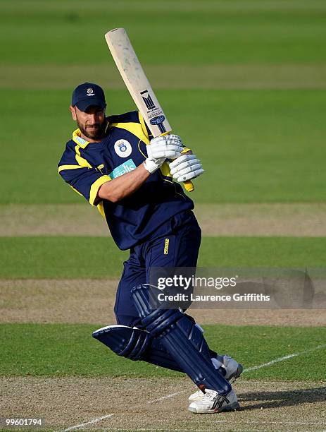 Nic Pothas of Hampshire hits out to the boundary during the Clydesbank Bank 40 League match between Nottinghamshire Outlaws and Hampshire Royals at...