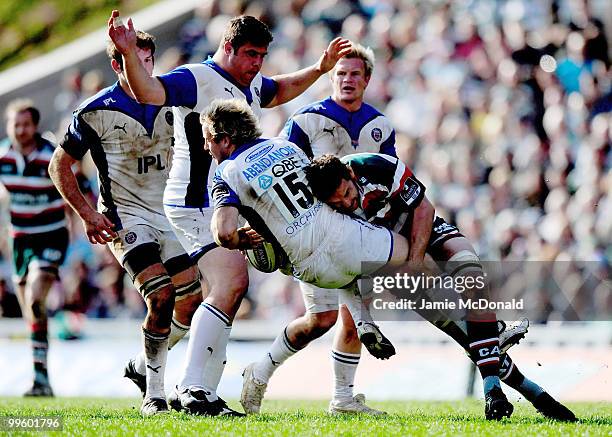 Nick Abendanon of Bath is tackled by Geordan Murphy of Leicester Tigers during the Guinness Premiership Semi Final match between Leicester Tigers and...
