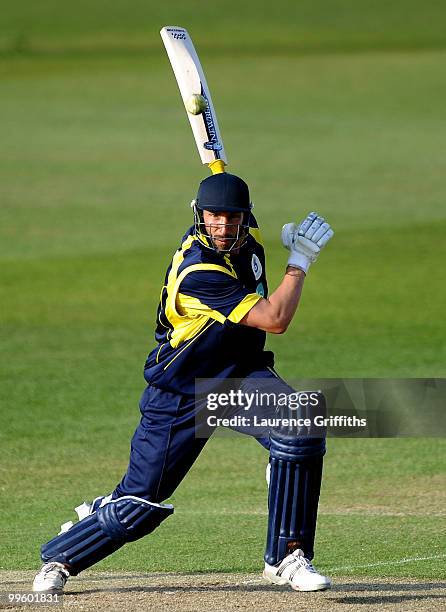 Nic Pothas of Hampshire hits out to the boundary during the Clydesbank Bank 40 League match between Nottinghamshire Outlaws and Hampshire Royals at...